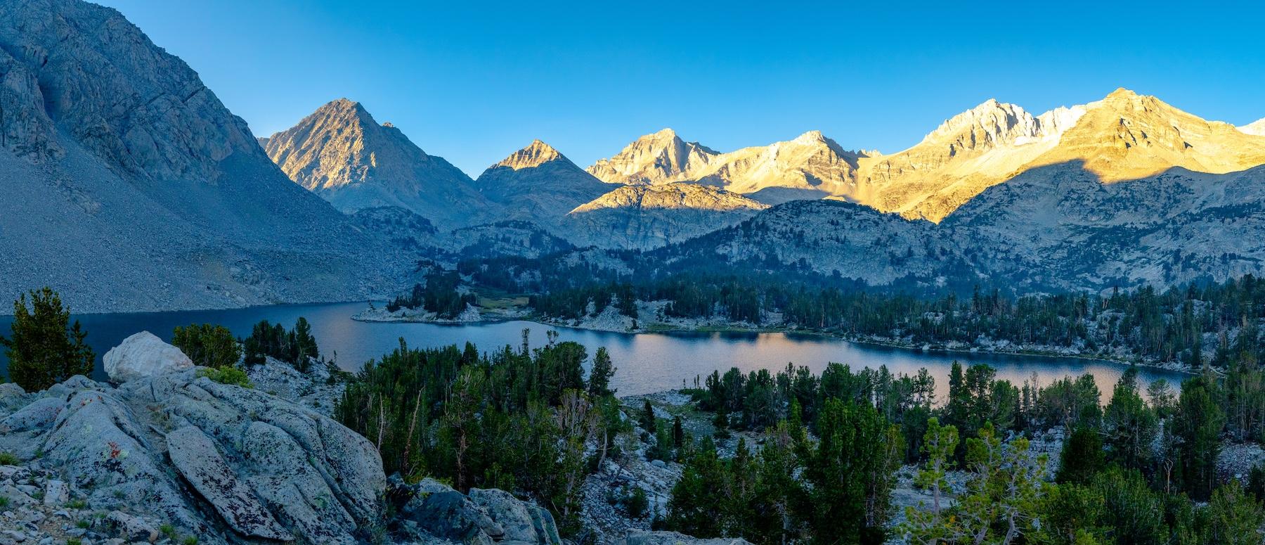 Panorama of a sunrise at Chickenfoot Lake in The Little Lakes Valley of the Sierras