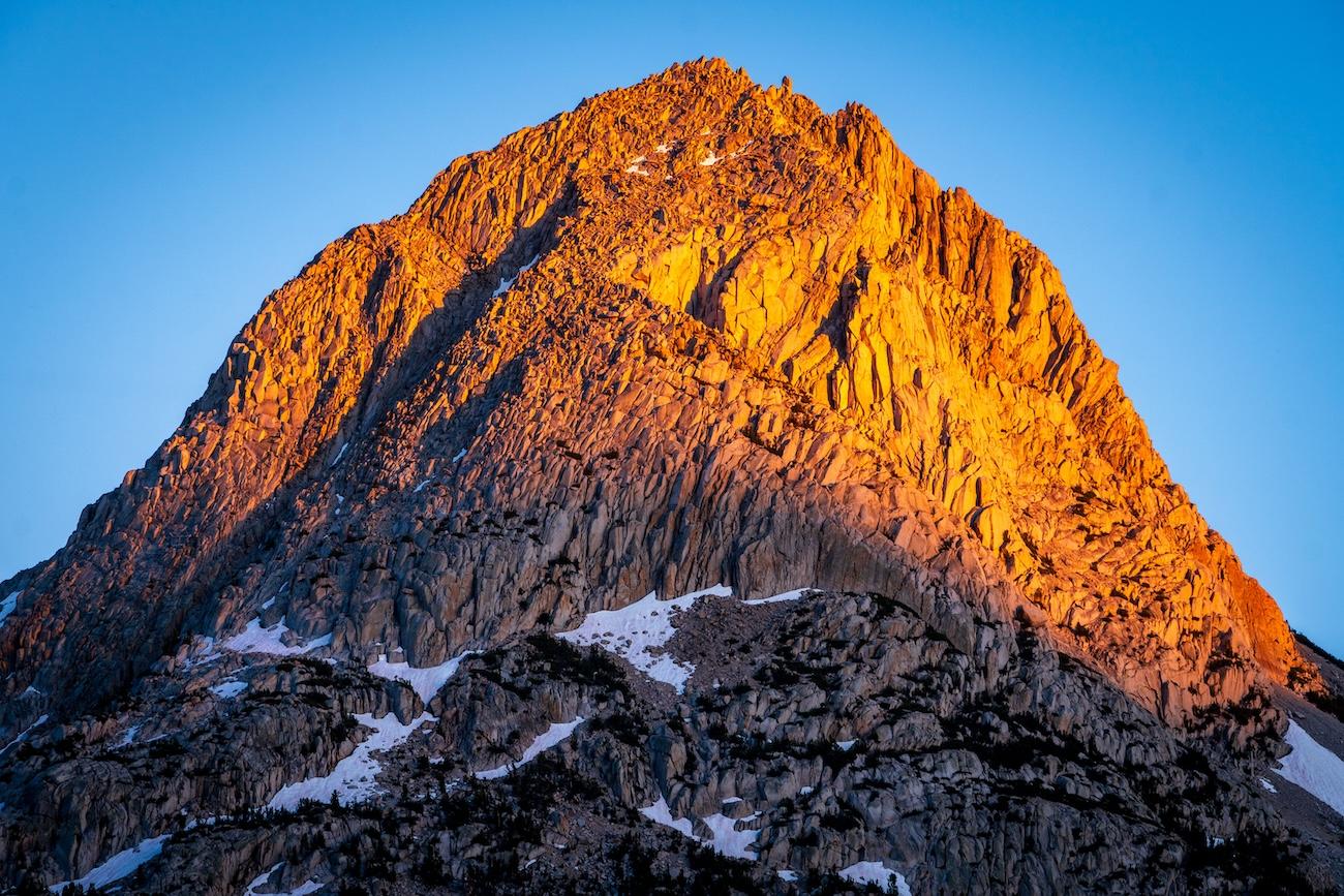 Sun setting on a peak in Evolution Valley in Kings Canyon National Park