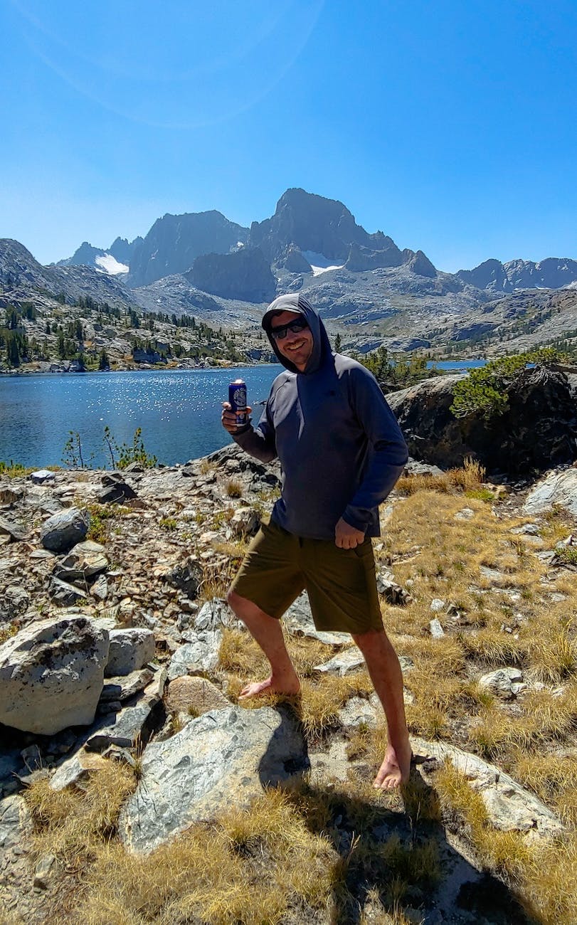 Brock Dallman enjoying a beverage on an island on Garnet Lake in the Sierras
