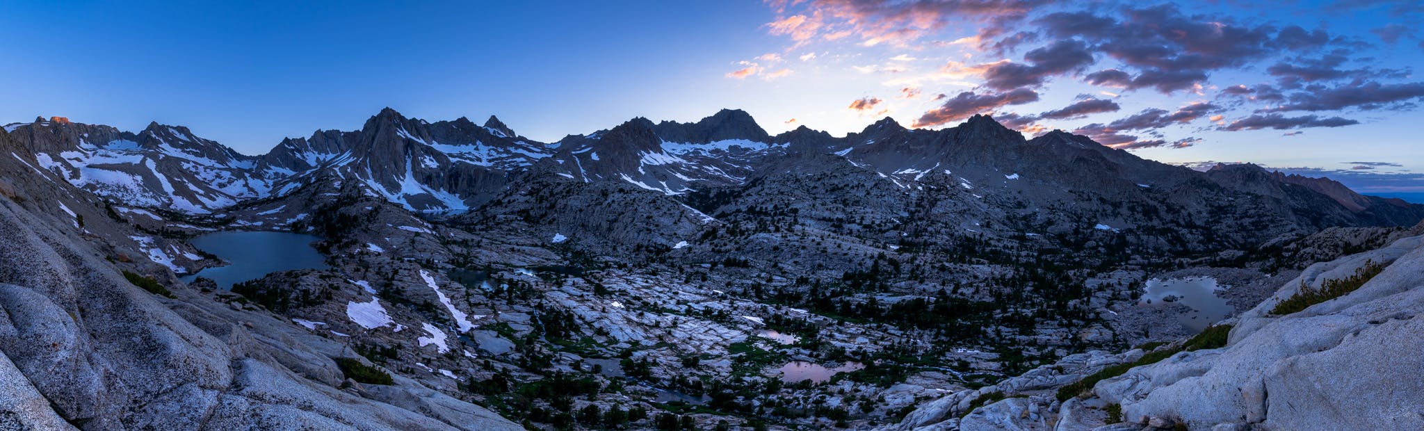 Panoramic shot of a purple sunset over the Sabrina Basin in the Eastern Sierra.  Photo by Brock Dallman