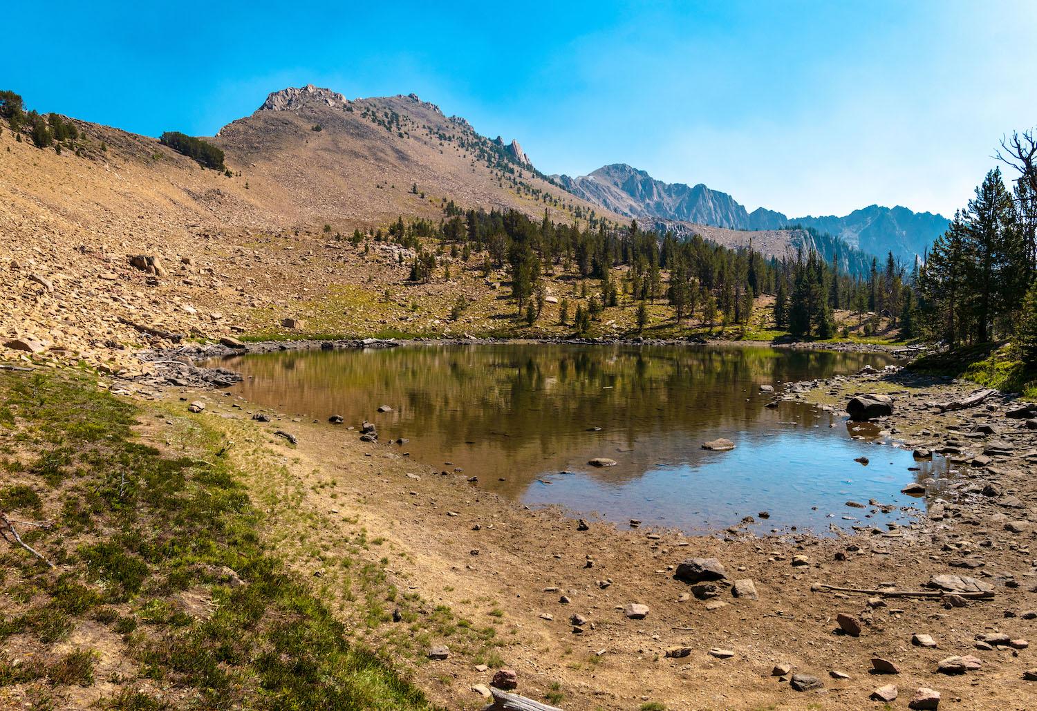 A trailside alpine tarn along the White Clouds Loop