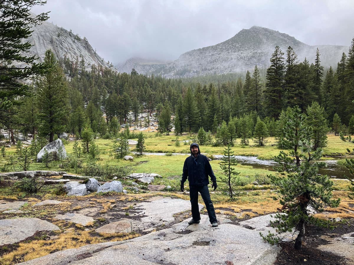 Brock Dallman in a rainstorm along the John Muir Trail