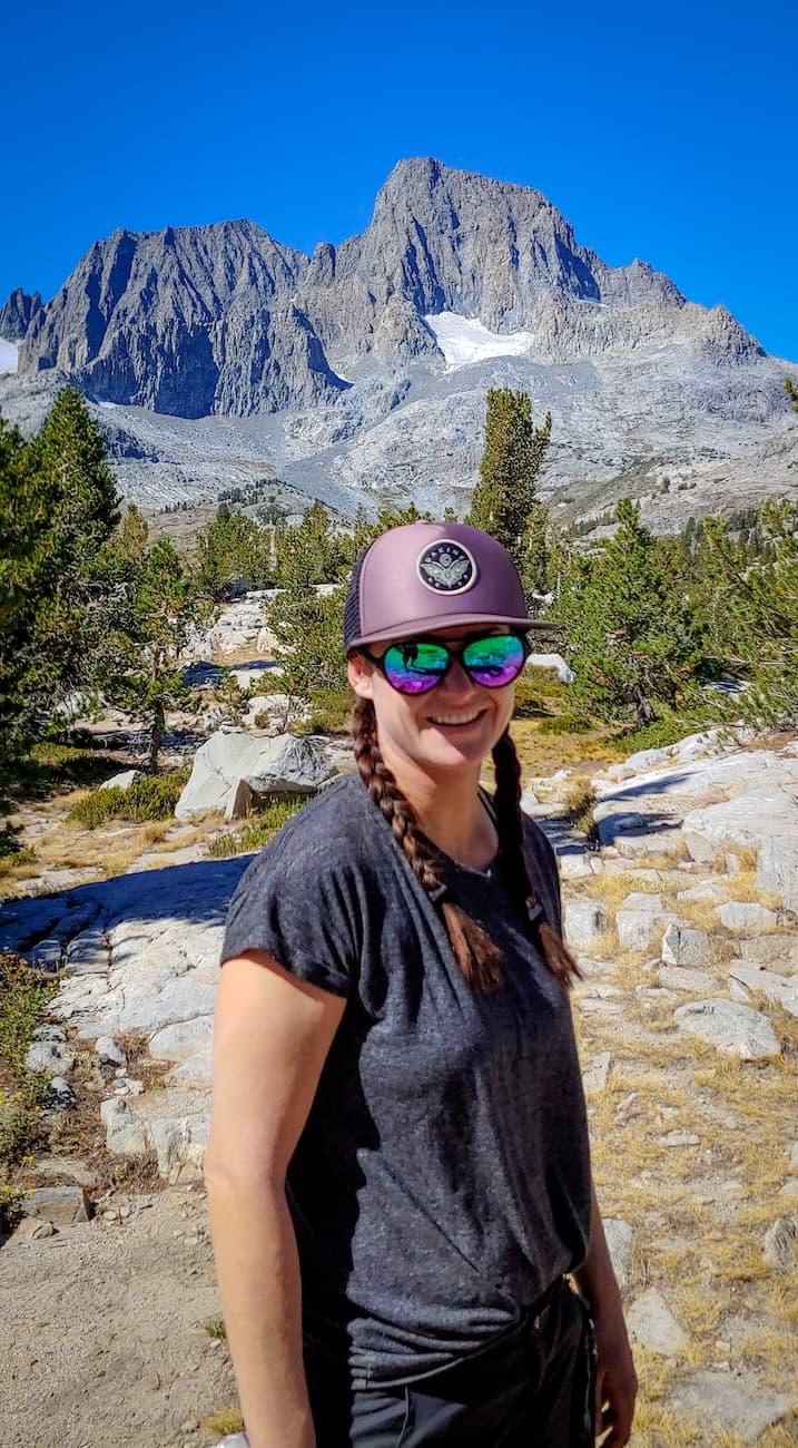 Sam Stych with Banner Peak in the background
