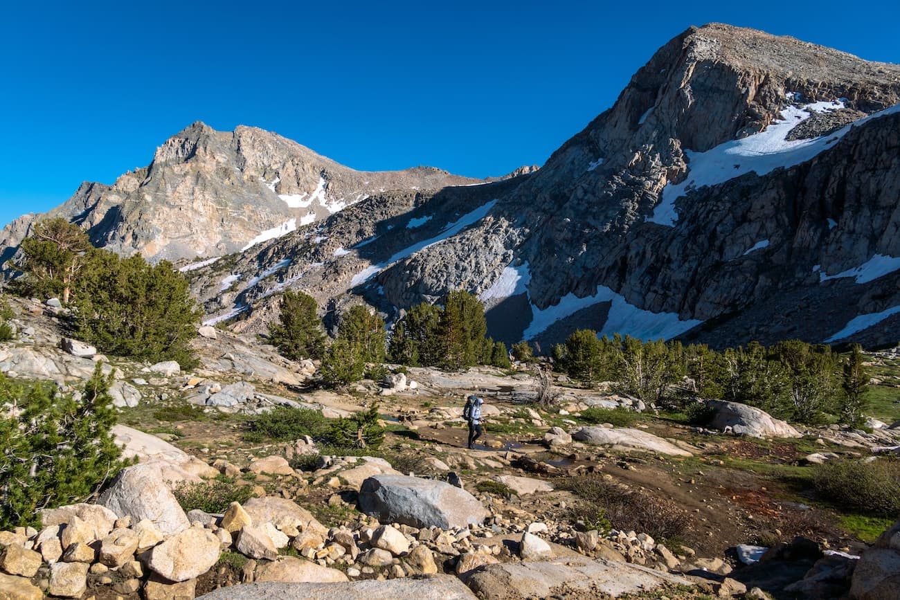 Sam Stych climbing towards Piute Pass