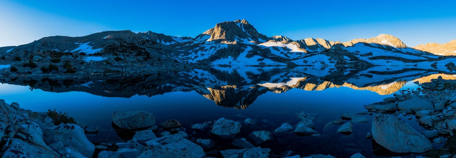 Morning reflection of Muriel Peak over Muriel Lake