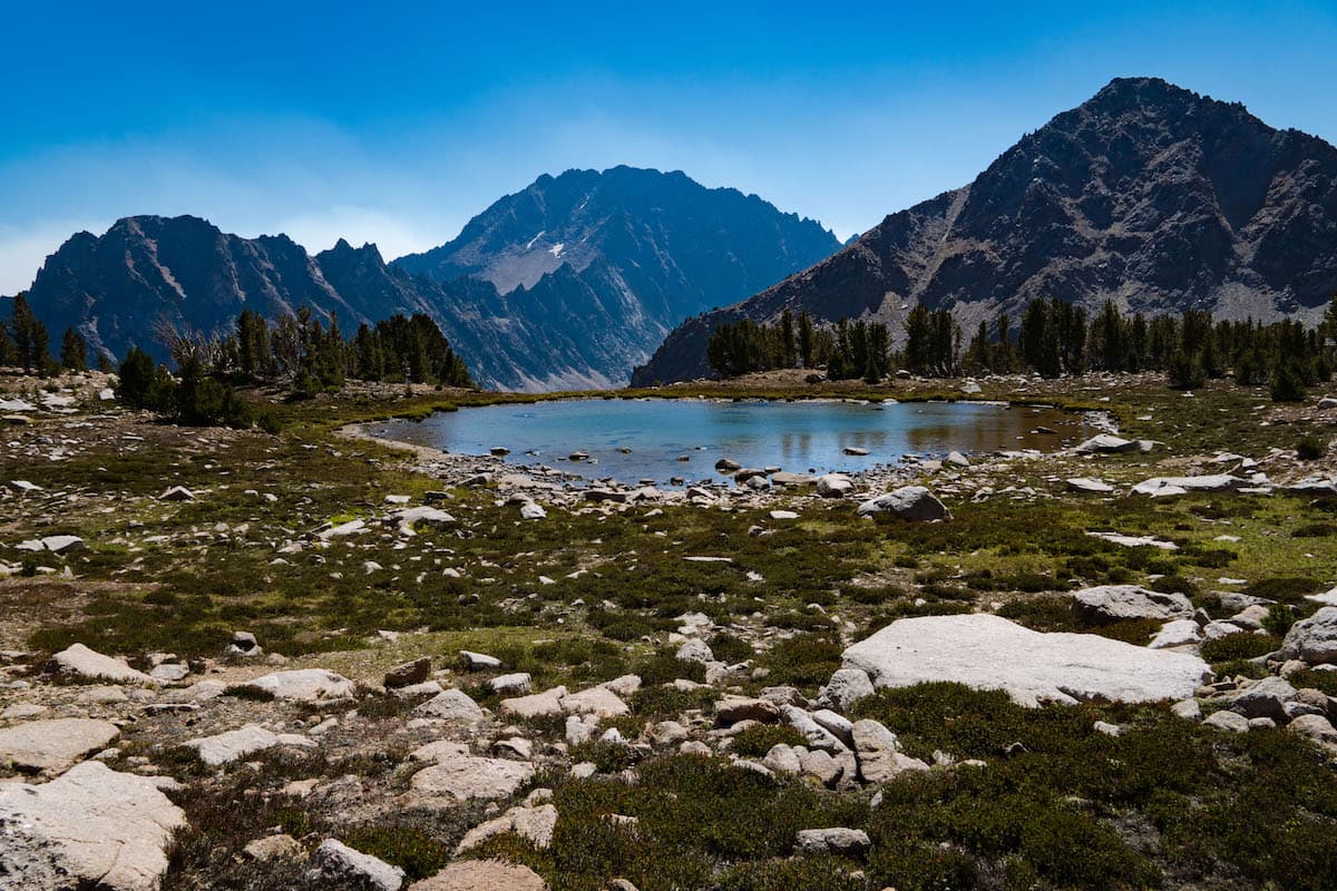 A mountain tarn with Castle Peak in the background
