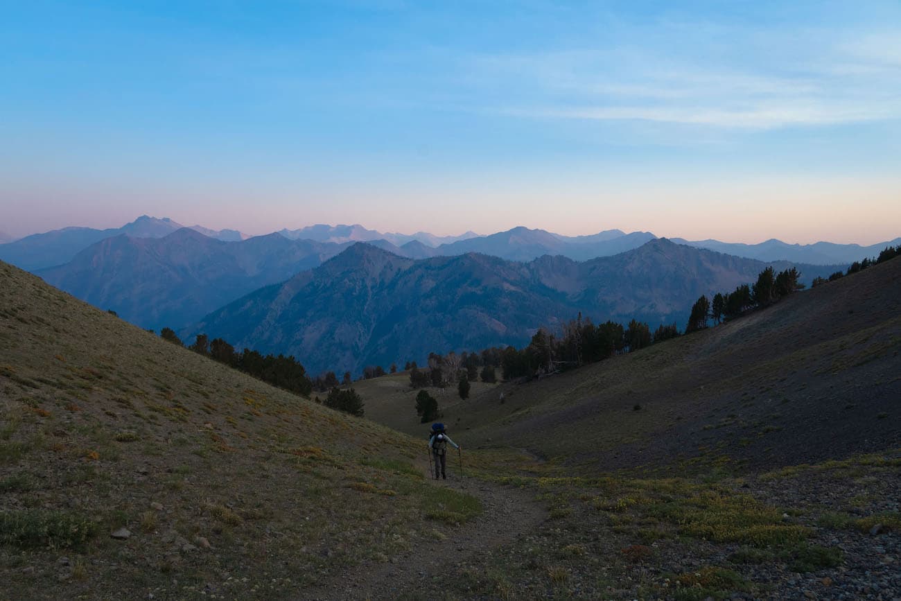 Sam Stych hiking up to the Castle Divide