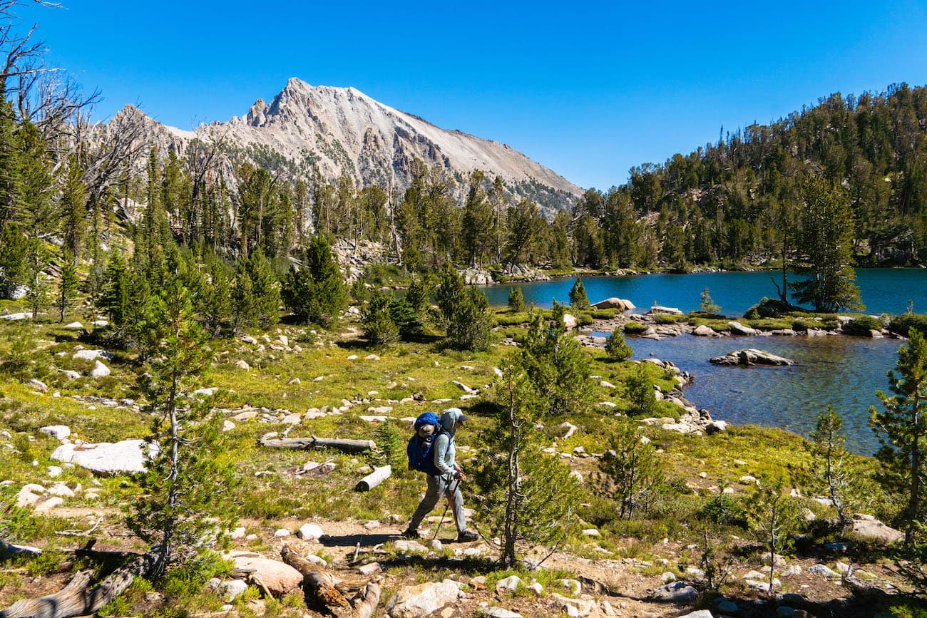 Sam Stych hiking by Scoop Lake on the White Clouds Loop trail
