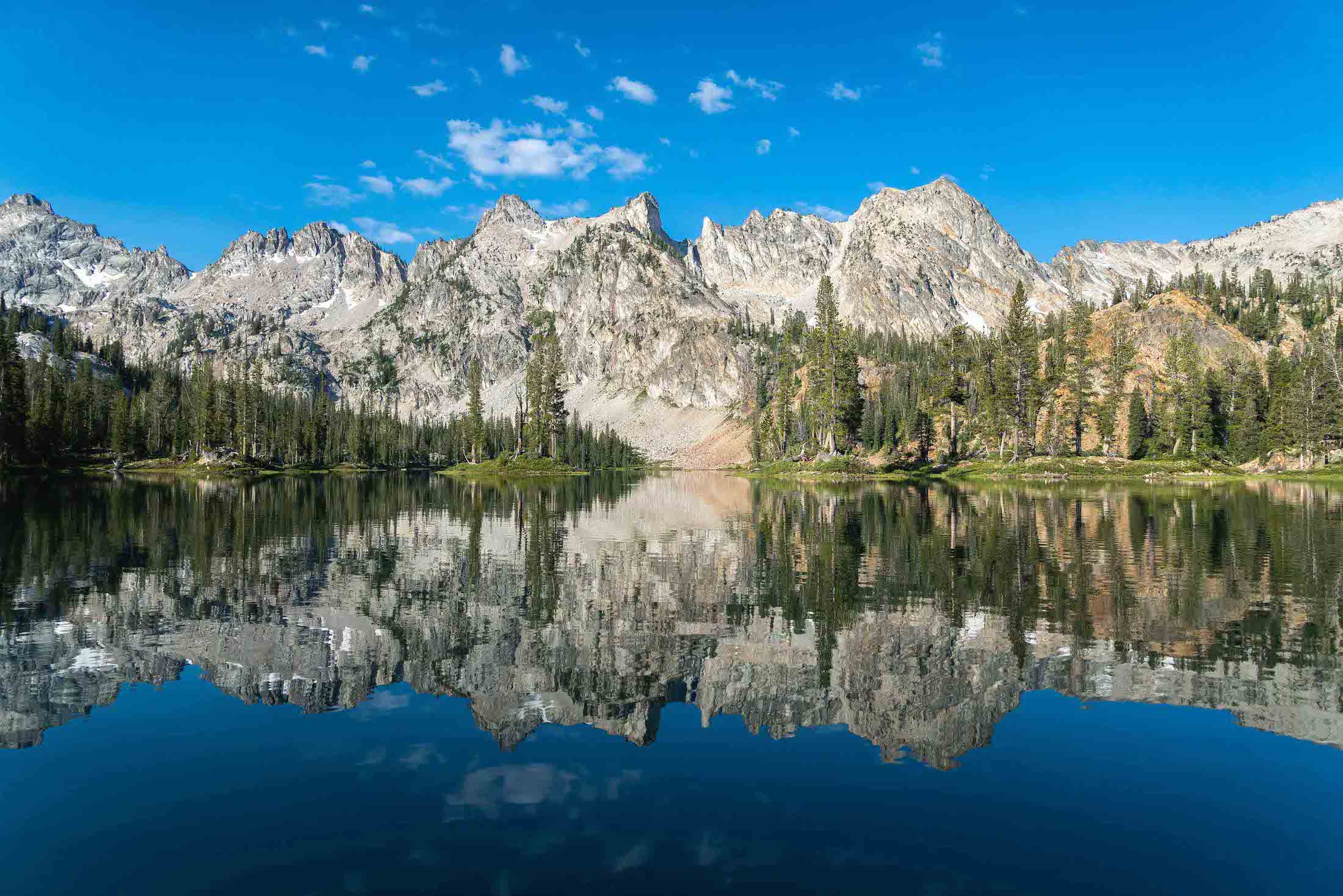 A reflection on Alice Lake in  Idaho's Sawtooth Mountains