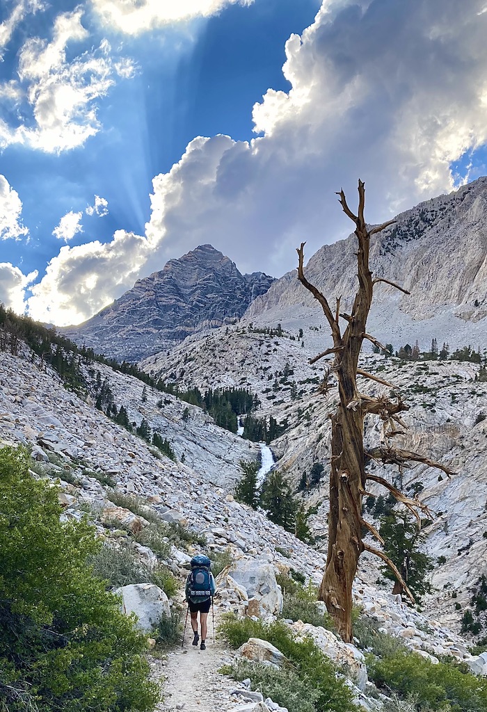 Sam Styck hiking down to the Pine Creek Trailhead in the Eastern Sierras